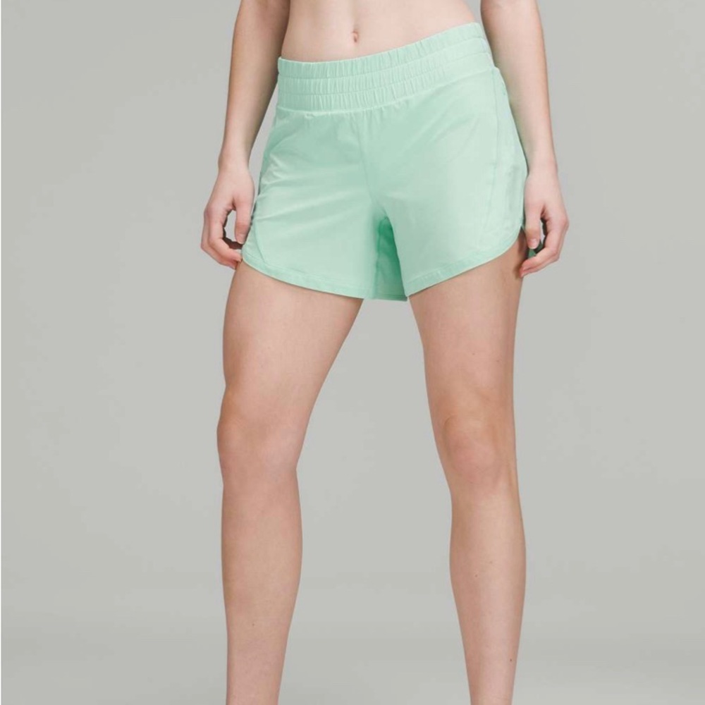 *never worn* lululemon Track That Mid-Rise 5” in Electric Mint; size 4
